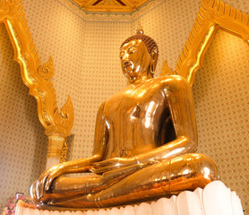 Pure Golden buddha statue in Temple of the Golden Buddha in Bangkok, Thailand
