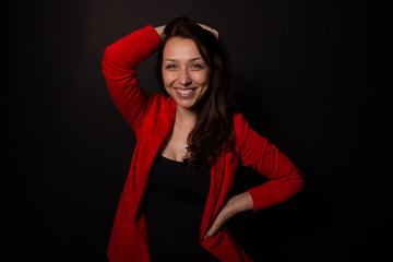 Fototapeta premium Caucasian woman throws up hair and smiles broadly. Own startup projects concept