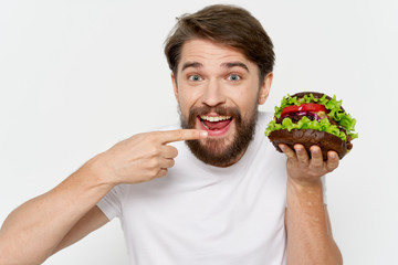 young man eating chocolate