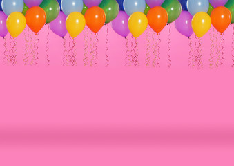 Many color balloons on pink background. Space for text