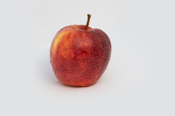 red apple with water drops