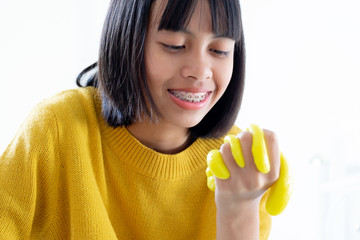 Hand Holding Homemade Toy Called Slime, Kids having fun and being creative by science experiment