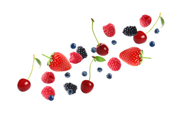 Set of falling sweet berries on white background