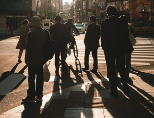 Crowd people walking on city street crosswalk Tokyo Japan