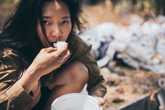 poor people or beggar begging you for help sitting at dirty slum.concept for poverty or hunger people,human rights,donate and charity for underprivileged children in third world