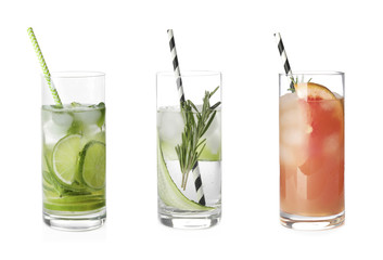 Set with different refreshing cocktails on white background