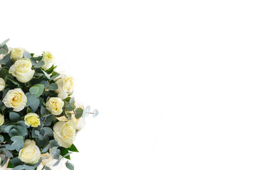 Bouquet of white roses, eucalyptus and Ruscus, view from above, a holiday, a gift for a woman, mom, postcard, free space, on a white isolated background