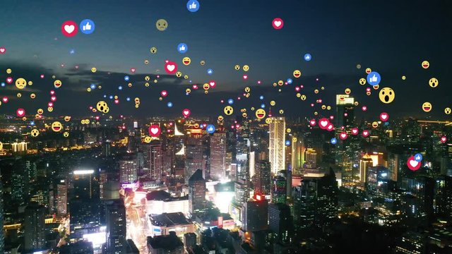 Aerial view of city with emojis