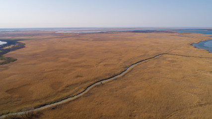 Small wild creek out of city from Drone