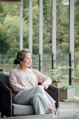 Fototapeta premium Portrait of older woman in Asia