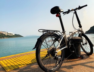 Fototapeta premium The bicycle bike with seascape and sky in Stanley Hong Kong