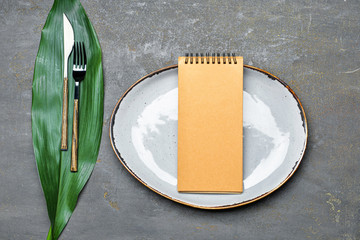 Beautiful simple table setting on grey background