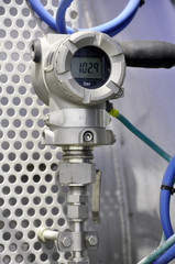 The pressure transmitter installed on process equipment