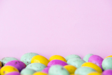 Fototapeta na wymiar Egg bean ball chocolates textured background