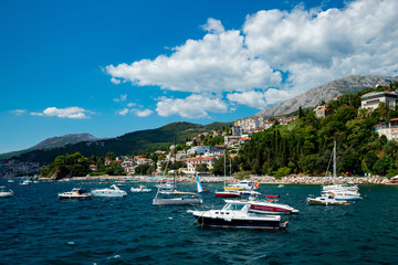 Fototapeta na wymiar cheerful boats from the sea bay
