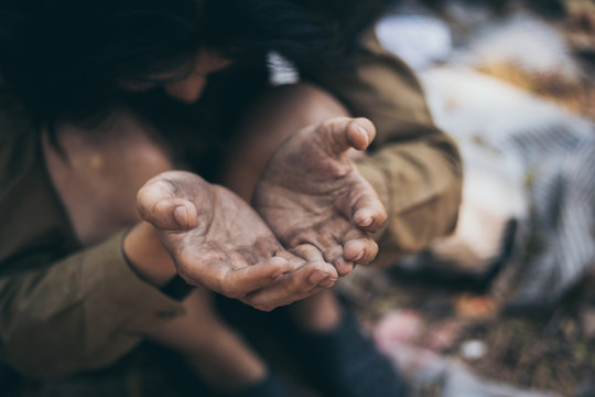 Poor People,homeless Or Beggar Begging For Help Sitting At Dirty Slum.concept For Poverty Hunger,human Rights,donate And Charity For Underprivileged Children In Third World