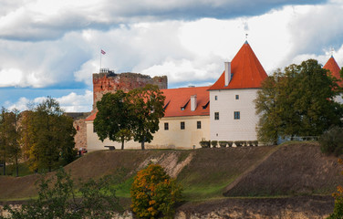 Fototapeta na wymiar beautiful palace on a hill in autumn