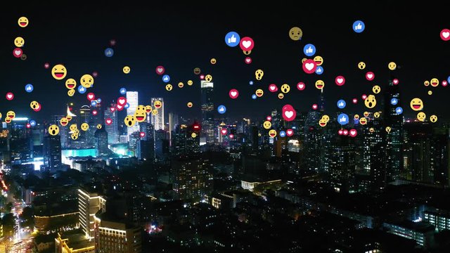 Aerial view of city with emojis
