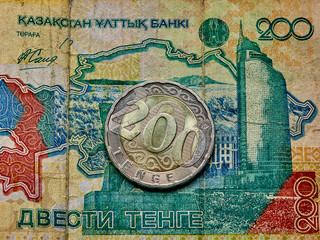 Tenge KZT. new coin 200 tenge and old tenge banknotes