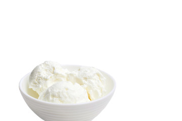 white bowl with white ice cream isolated on a white background.