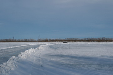 winter road on the river, the island's connection to the mainland