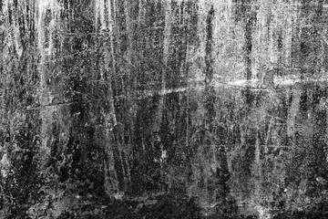 Texture of a concrete wall with cracks and scratches which can be used as a background