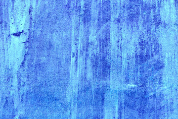 Texture of a concrete wall with cracks and scratches which can be used as a background