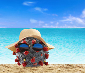 Coronavirus molecule at the beach in vacation taking truce