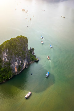 Aerial view Ba Hang floating fishing village, rock island, Halong Bay, Vietnam, Southeast Asia. UNESCO World Heritage Site. Junk boat cruise to Ha Long Bay. Famous destination of Vietnam