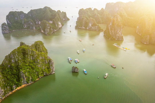 Aerial view Ba Hang floating fishing village, rock island, Halong Bay, Vietnam, Southeast Asia. UNESCO World Heritage Site. Junk boat cruise to Ha Long Bay. Famous destination of Vietnam