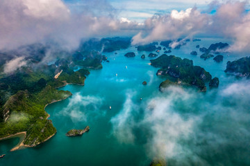 Aerial view of Sang cave and Kayaking area, Halong Bay, Vietnam, Southeast Asia. UNESCO World Heritage Site. Junk boat cruise to Ha Long Bay. Popular landmark, famous destination of Vietnam