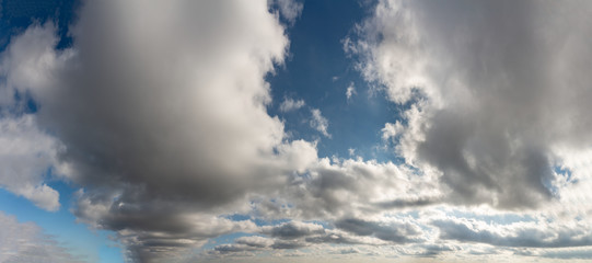 Obraz premium Fantastic clouds against blue sky, panorama