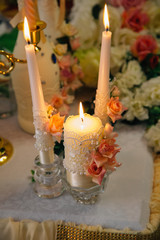 candles decorated with lace and flowers