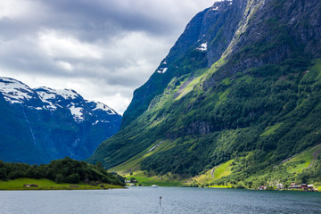Fototapeta premium clouds over Naeroyfjord in Western Norway