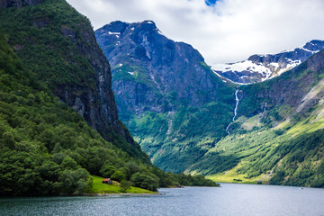 Fototapeta premium clouds over Naeroyfjord in Western Norway