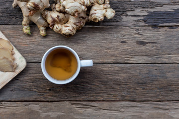 Hot ginger on the old wooden floor Drinking prevent flu