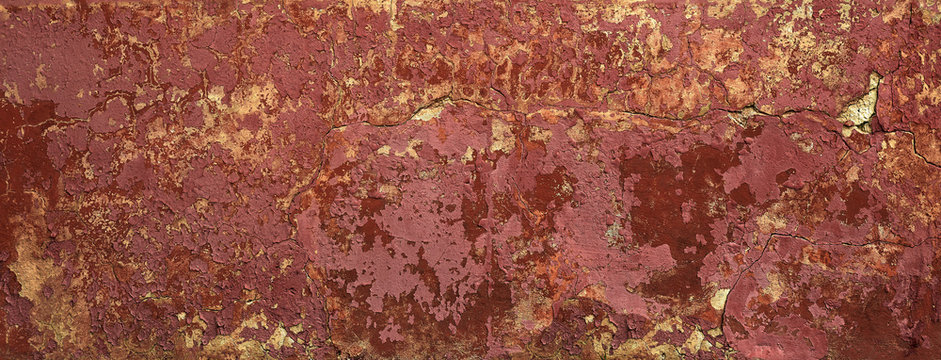 panoramic terracotta stucco background with cracks