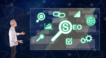 A seo concept explained by a businessman on a wall screen