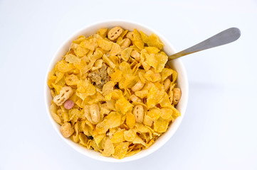 cereal in a white bowl on white background. Healthy breakfast concept.