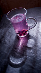 glass of compote with currant berries