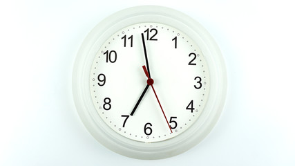 White clock beginning of time 09.58 am or pm, on white background, Copy space for your text, Time concept.