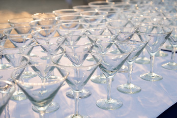 many clean martini cocktail glass at seaside dinner