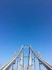 Fototapeta na wymiar ferris wheel on a blue sky