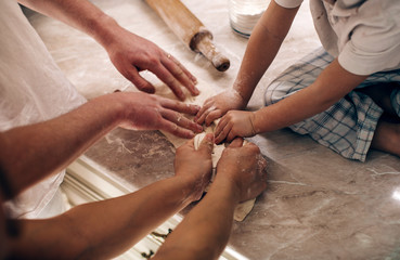 Obraz premium Family hands kitchen. Family concept. 