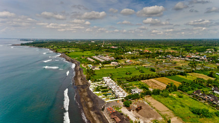 Aerial view of  black sand beach.  Surfing beach Bali, Indonesia.