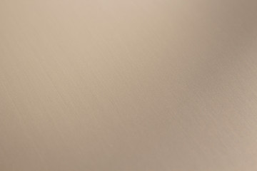 fractally scratched diagonal lines to the silver surface of the metal, stainless steel. Creative lighting details macro photography.