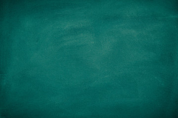 Green Chalkboard. Chalk texture school board display for background. chalk traces erased with copy space for add text or graphic design. Backdrop of Education concepts 
