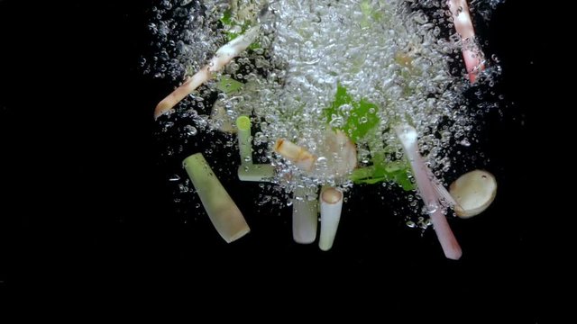 tom yum ingredient drop water slower motion