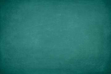 Green Chalkboard. Chalk texture school board display for background. chalk traces erased with copy space for add text or graphic design. Backdrop of Education concepts 