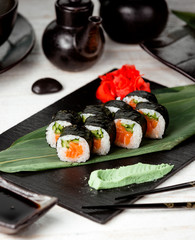 black sushi set with rice and salmon